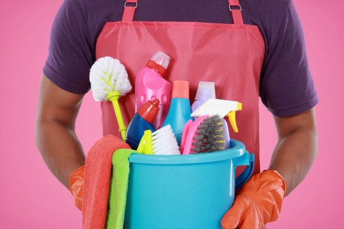 Local cleaner vacuuming a Brentford home with careful attention to detail