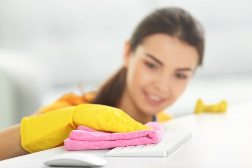 Cleaner identifying workplace hazards during a cleaning task