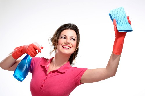 Local cleaning team preparing a Brentford apartment for new occupants